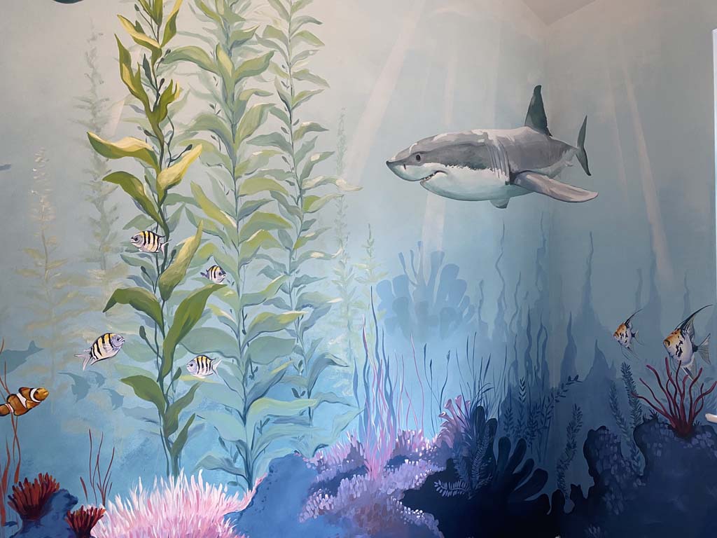 Undersea room mural featuring shark and fish